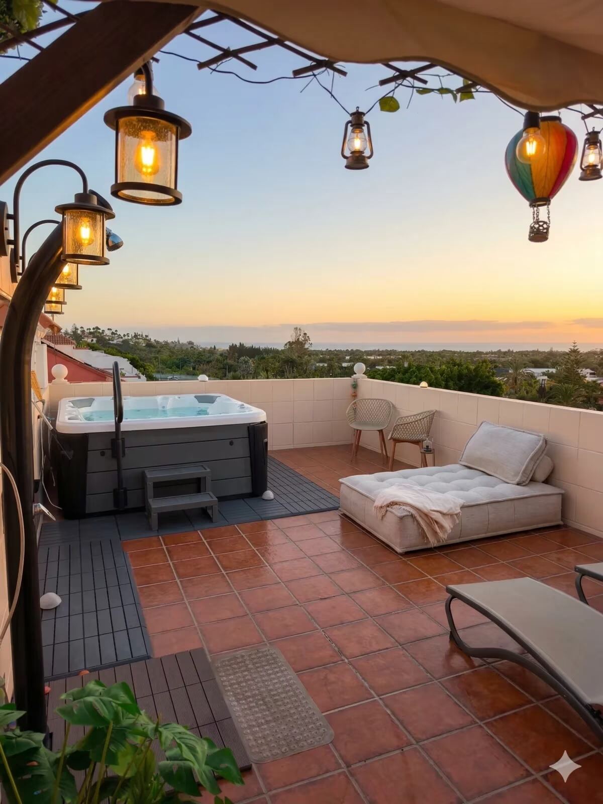 Rooftop hot tub terrace at sunset — Basement Apartments, Maspalomas